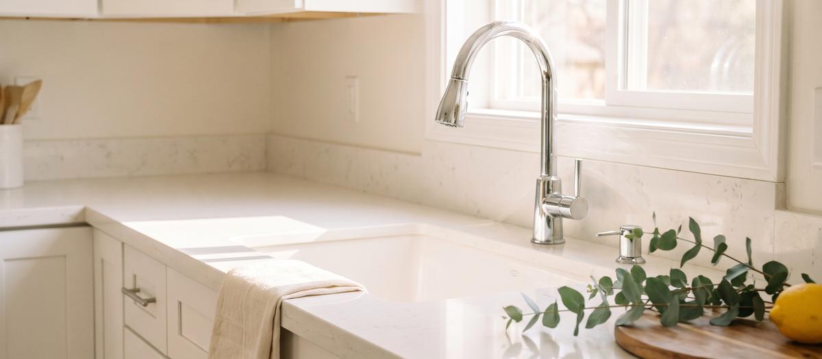 Bright kitchen counter and sink after a deep clean