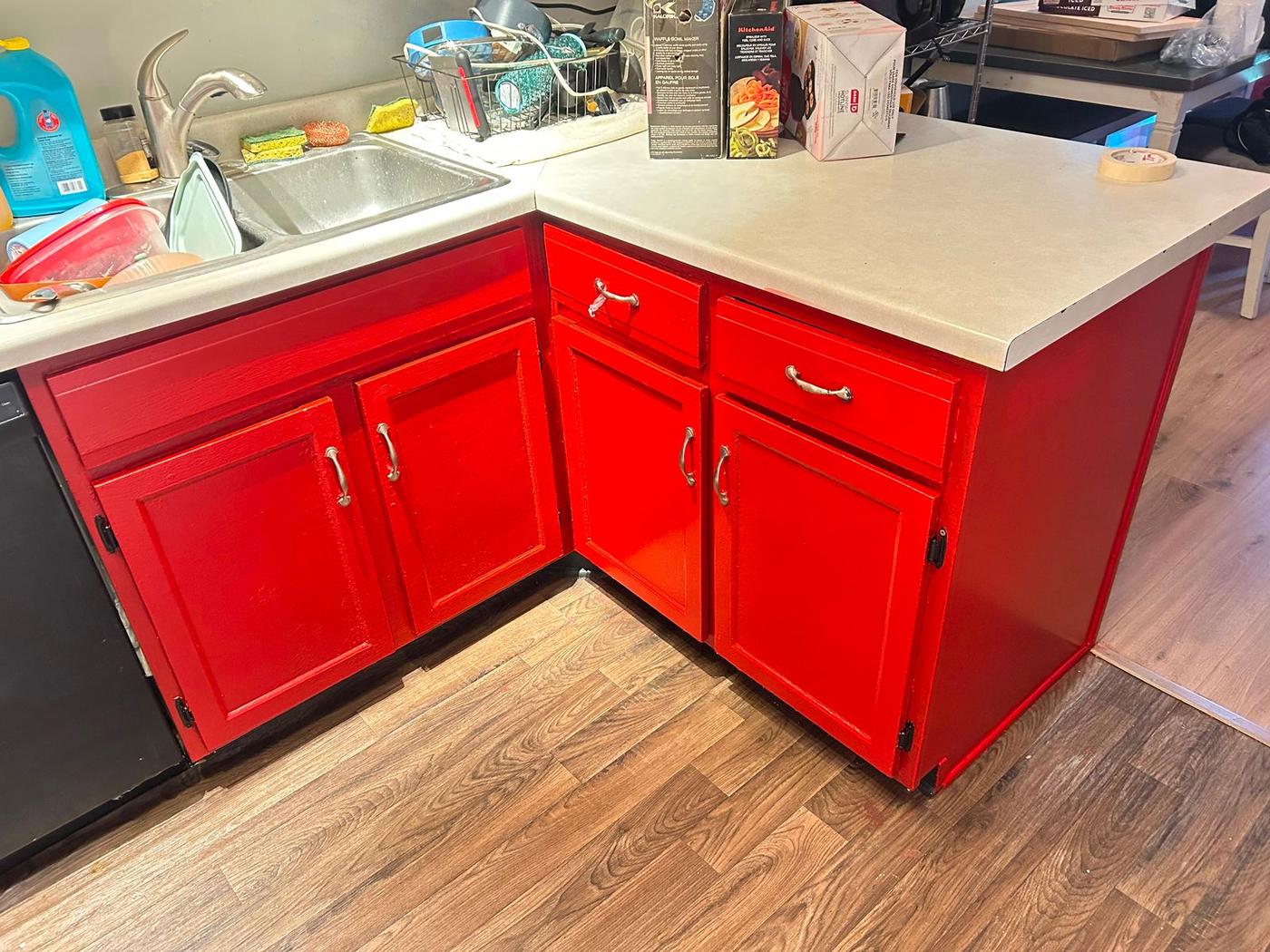 Kitchen cabinets freshly painted glossy red