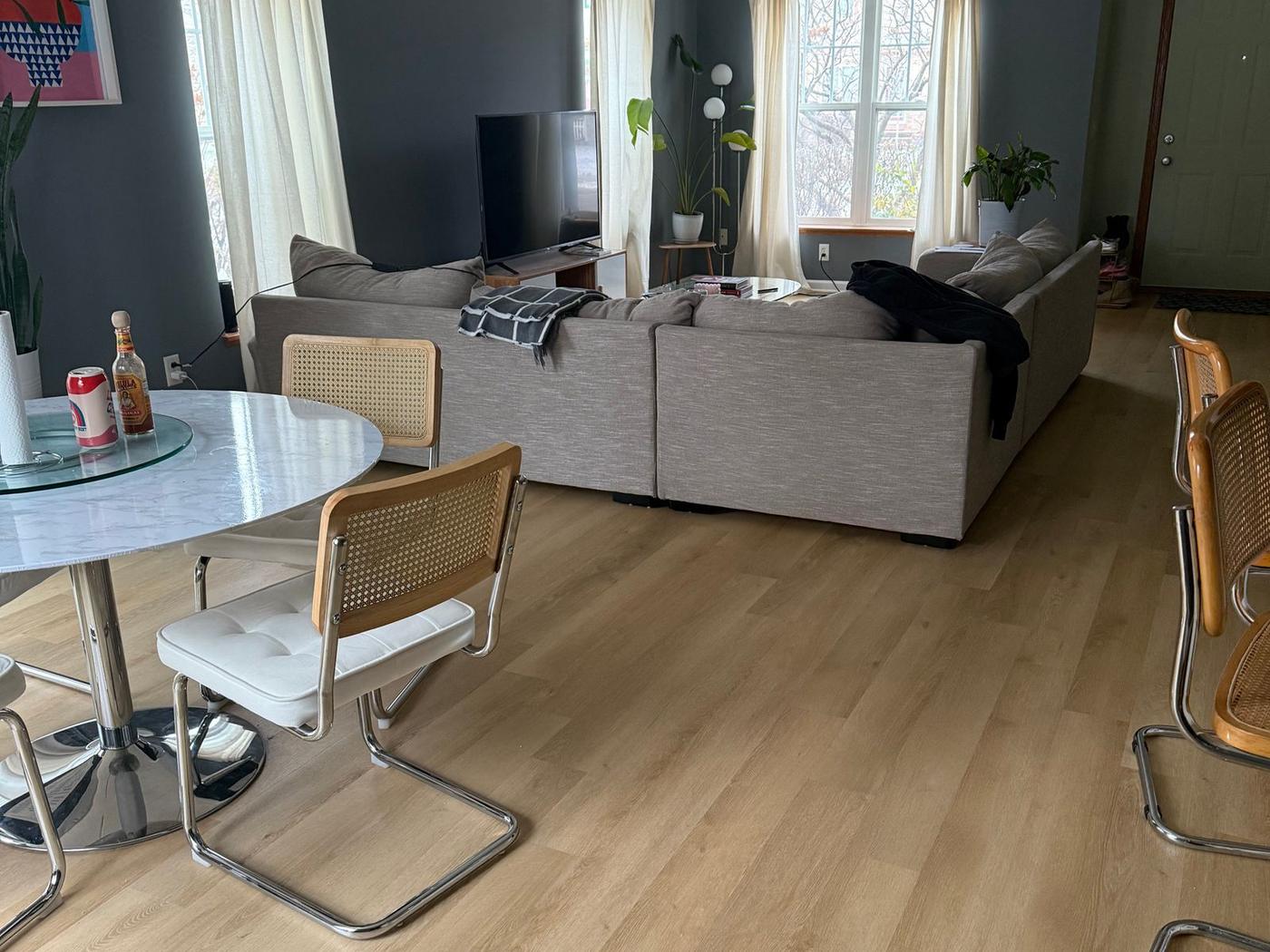 Living room with dark blue walls before repainting