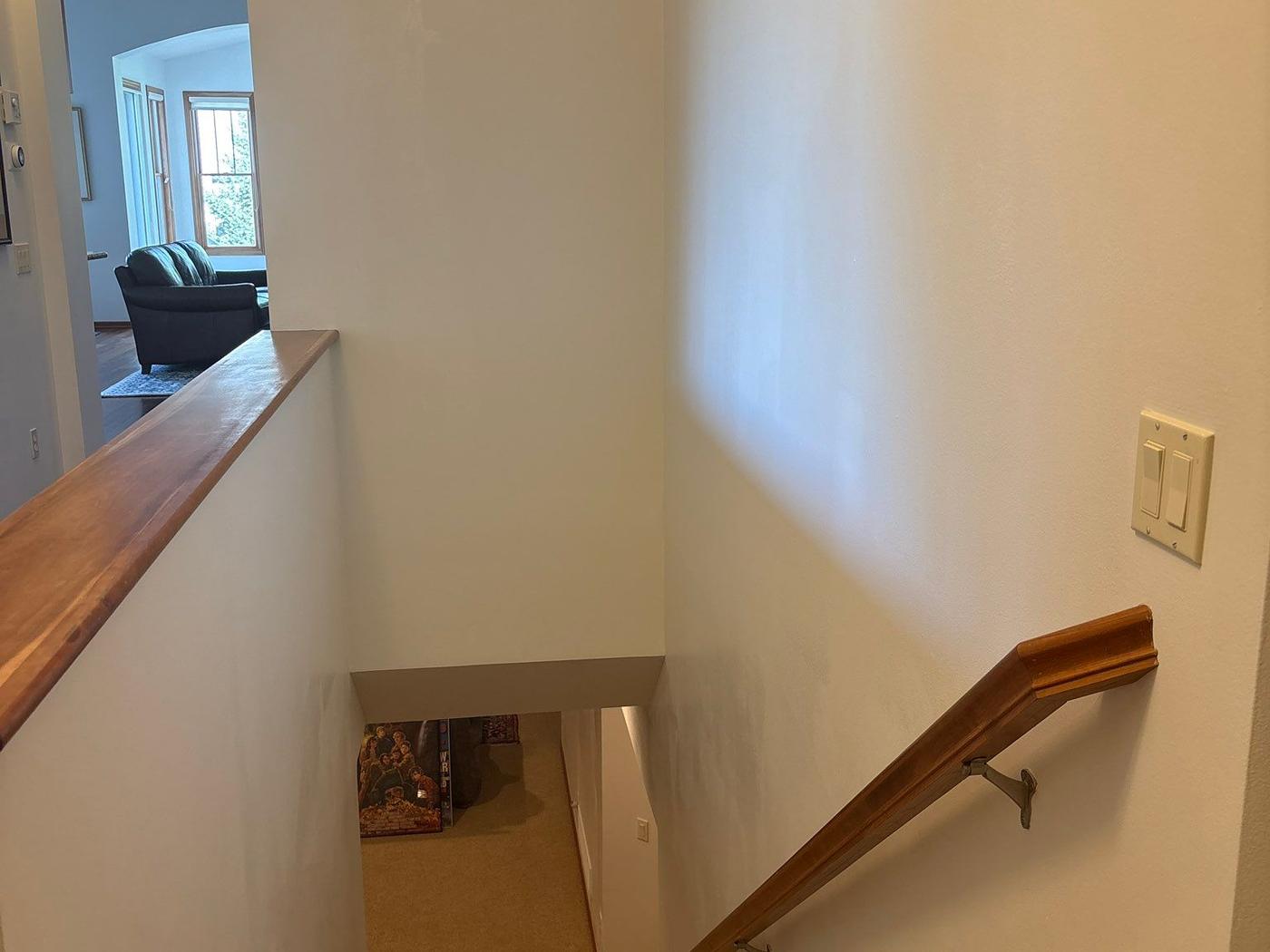 Stairwell painted a soft white after the job